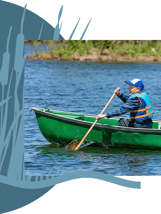 Someone kayaking out in a lake. 