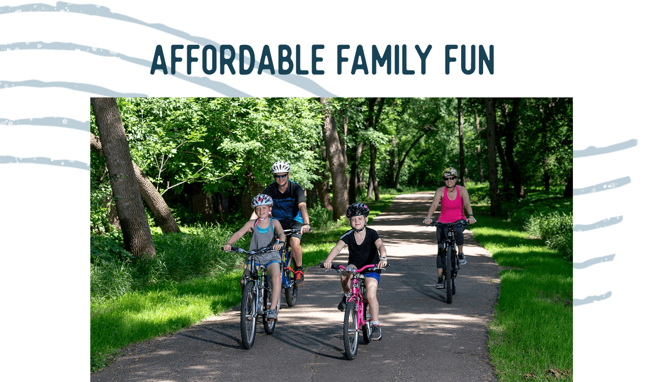 A family bicycles down a tree-lined road. A headline reads: Affordable Family Fun.