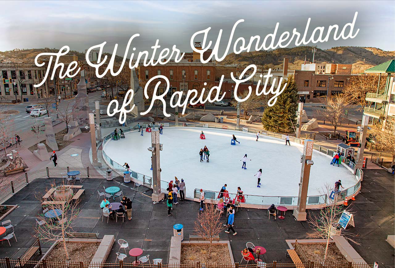 An aerial view of an outdoor ice rink in Rapid City. A headline reads: The Winter Wonderland of Rapid City